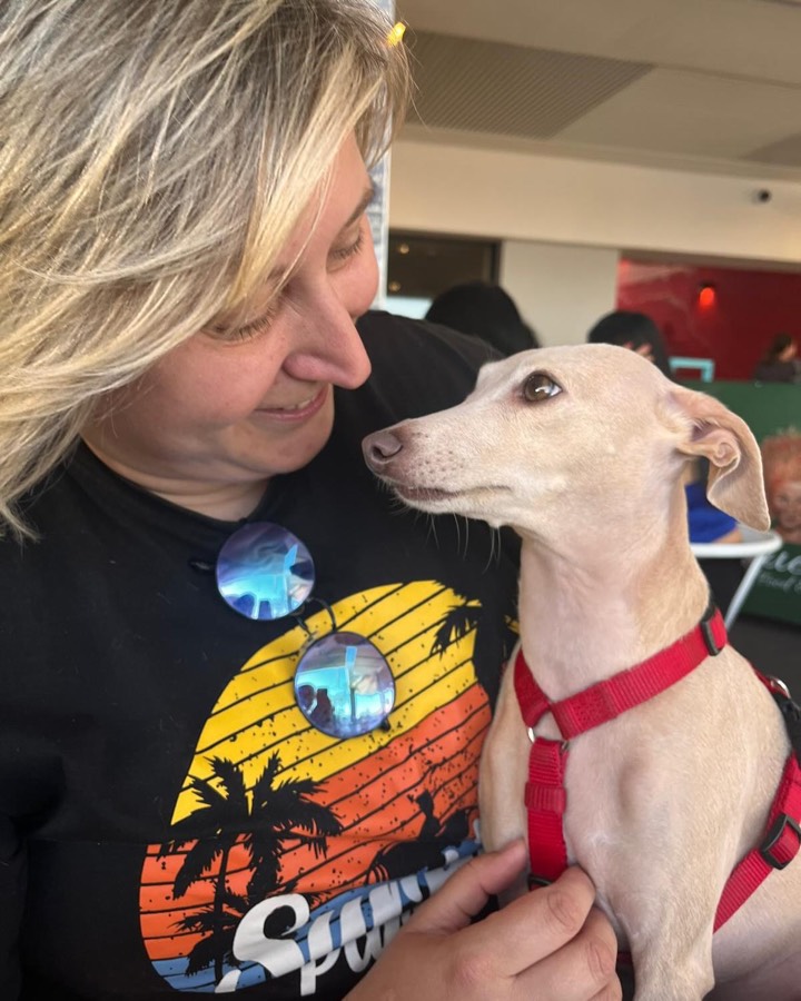 Halyna nose to nose with a dog